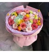 букет из розовых роз, голубой и розовой гортензии, розовых гербер, жёлтых кустовых роз, зелёных гвоздик и краспедии в упаковк